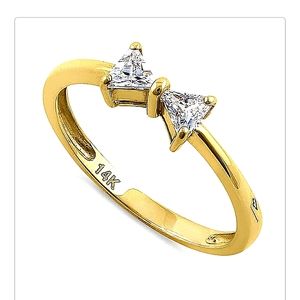 Real 14 karat gold Bow ring with Czs.GOLD IS NOT Negotiable PRICE IS FIRM